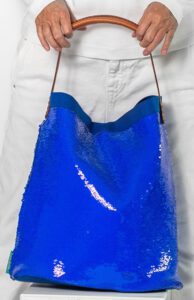Shiny Victoria-Blue sequin bag with a real leather handle. Weighs just 550 grams, super light, and has plenty of space with dimensions of about 41 x 42 cm