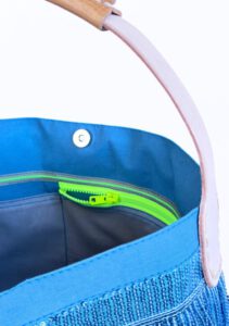 Fashionbag with a big zipper pocket, extra pocket for business cards and mobile